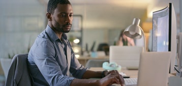man working on laptop